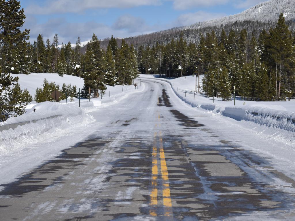 An icy road in the winter in Yellowstone National Park in Wyoming.