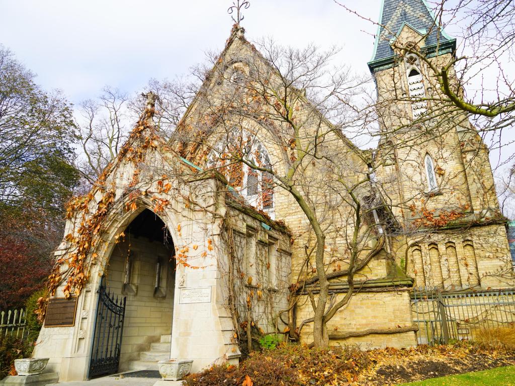 Beautiful Gothic Revival chapel during a grey autumn day