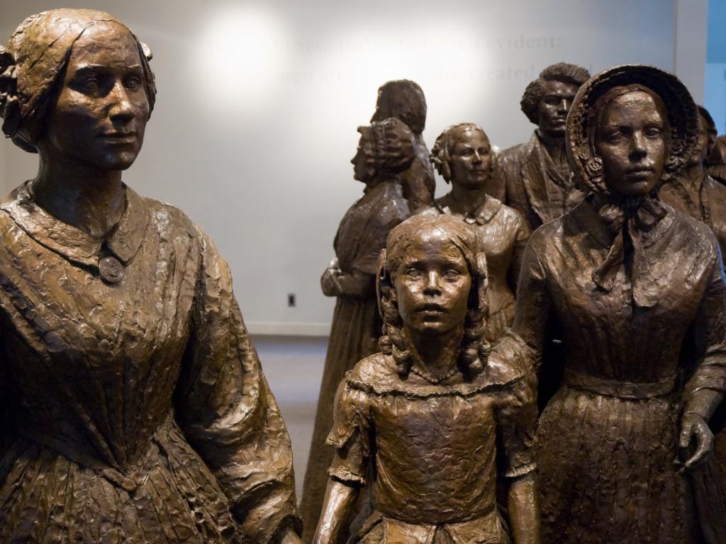 Statues of two women and a female child at the Women's Rights National Historical Park, Seneca Falls