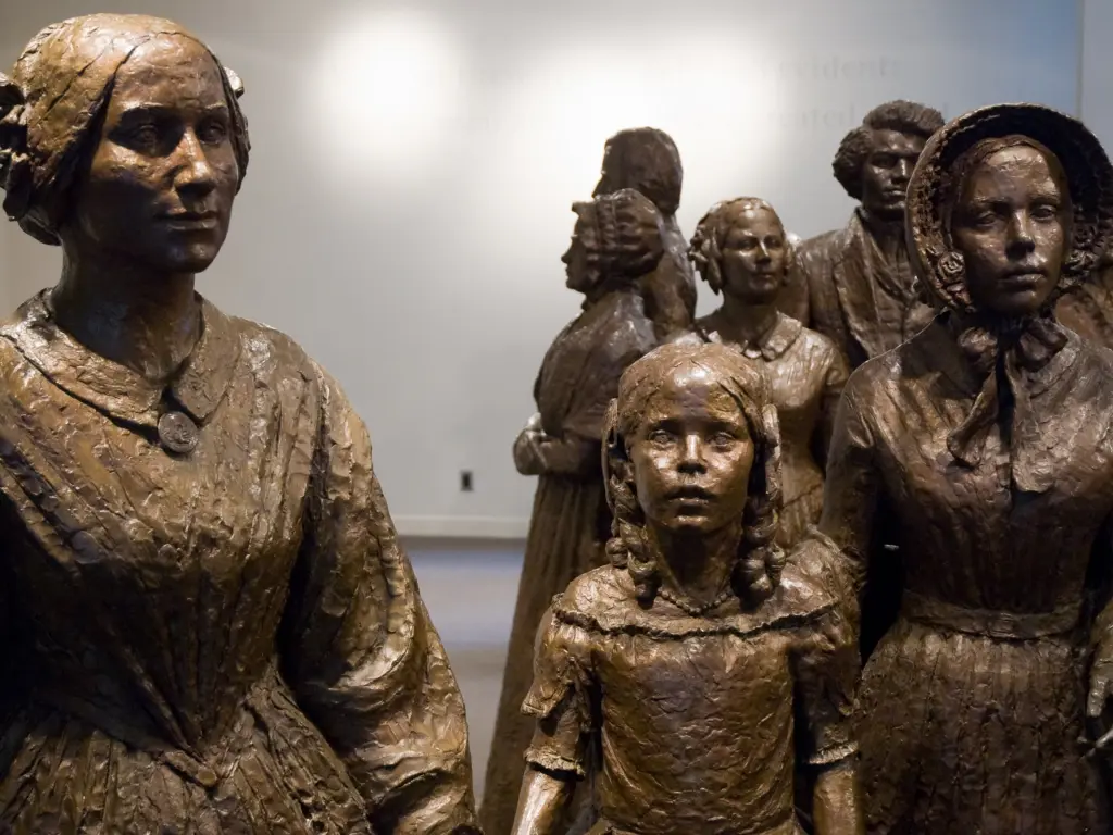 Statues of two women and a female child at the Women's Rights National Historical Park, Seneca Falls