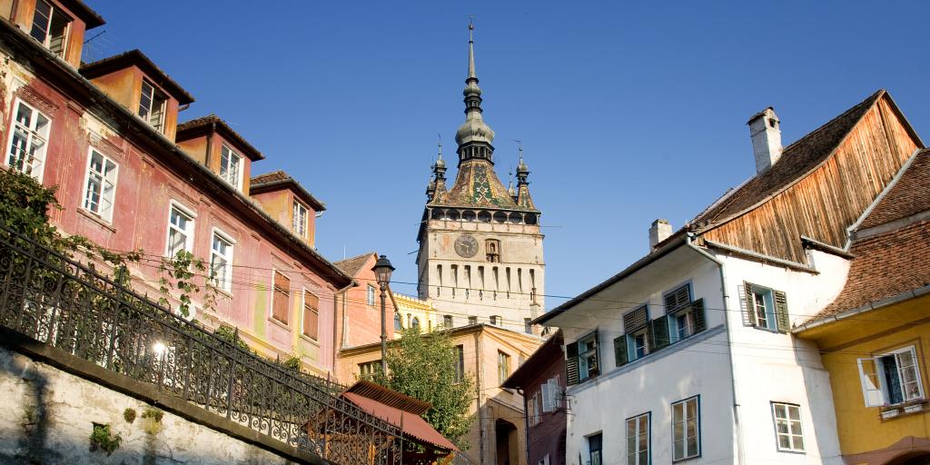 Sighisoara Clock Tower towering above the houses in Romania