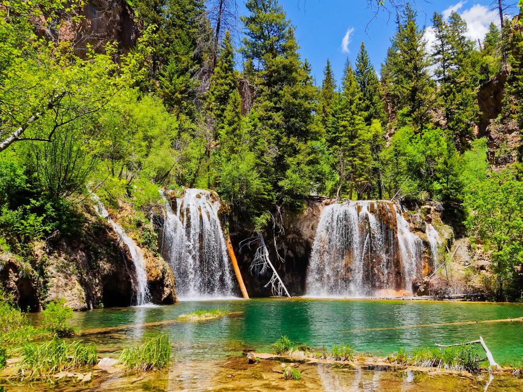 The serene waterfalls flowing into Hanging Lake near Glenwood Springs in Colorado