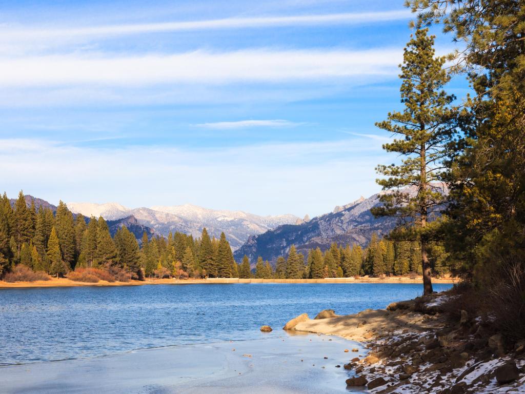 Lake Hume near to Kings Canyon in winter, with snowy mountains in the background