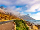Robberg area on the Garden Route by the ocean, with mountains and clouds in the background