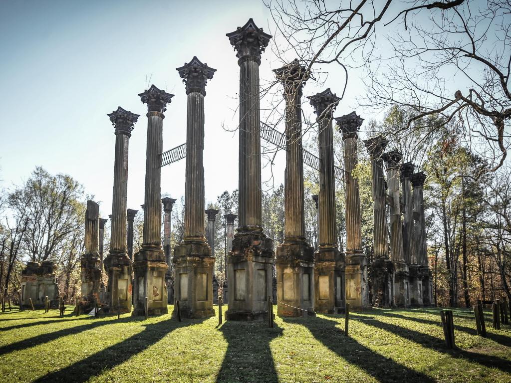The towering Windsor Ruins at Port Gibson, MS, casting shadows across the ground