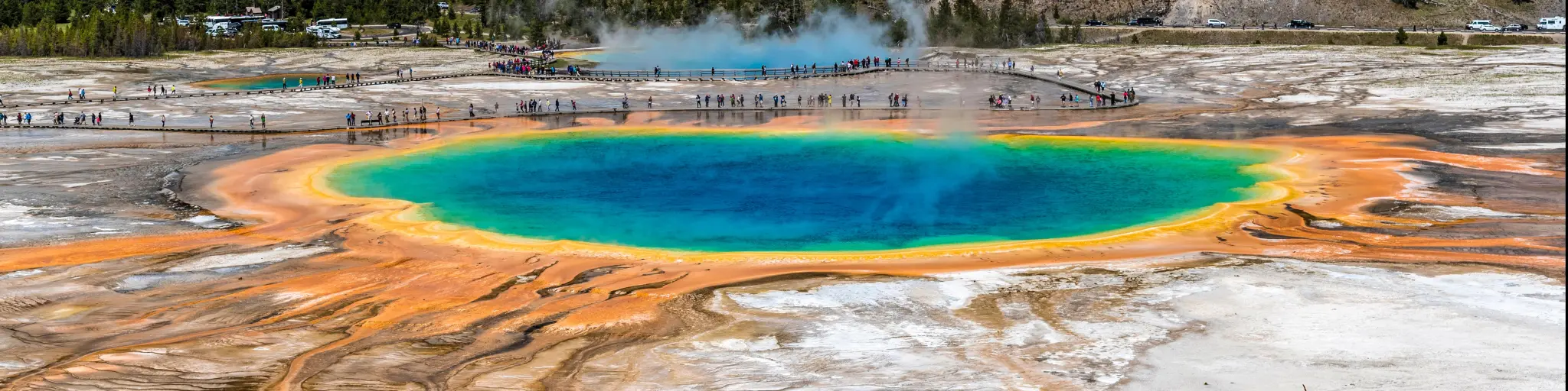 Grand Prismatic Springs and geyser basin landscape at Yellowstone National Park.