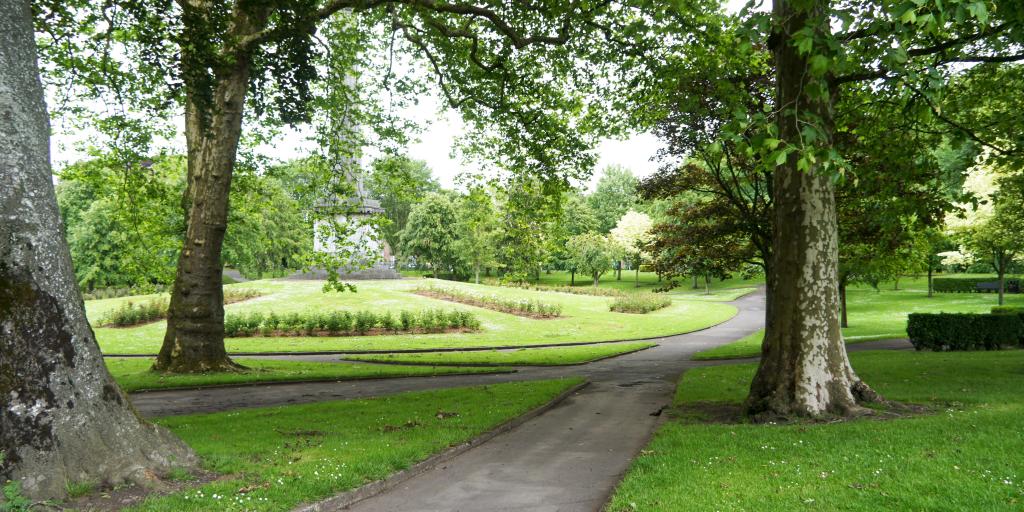 Trees and a monument in People's Park, Limerick