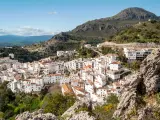 The white village of Casares in southern Spain is built into the hills 