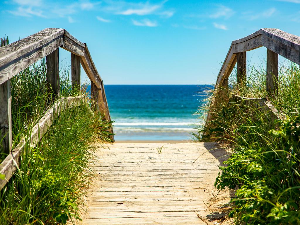 Pathway in Ogunquit, Maine, USA with the sea in the distance on a sunny day.