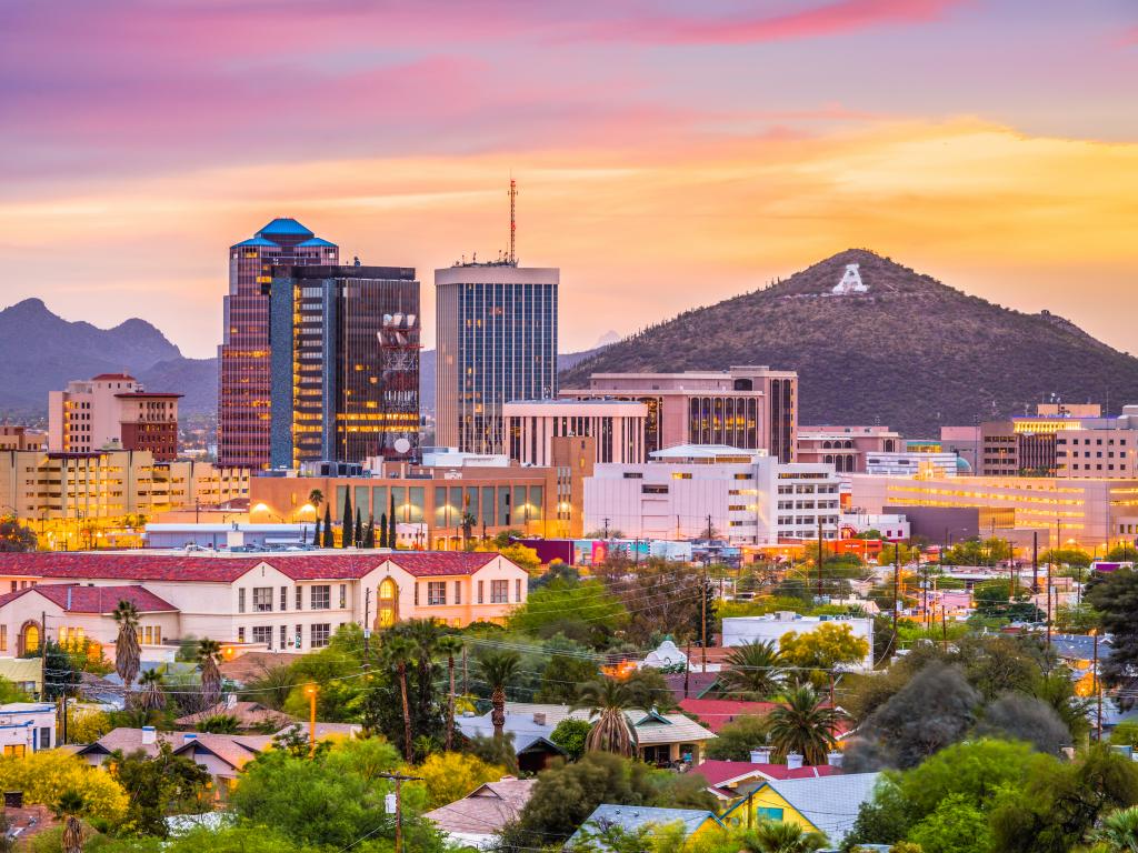 Tucson, Arizona, USA downtown skyline with Sentinel Peak at dusk