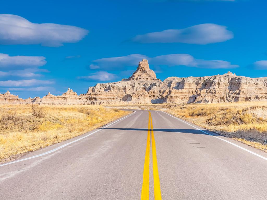 Badlands National Park in South Dakota, USA Badlands Loop Road in Badlands National Park in South Dakota, USA. Cloudy Blue Sky - Summer Day