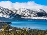 Snow capped Sierra Nevada Mountains behind Lake Tahoe, California