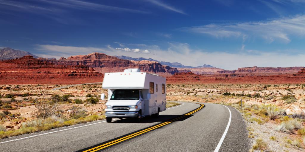 A motor home driving along a road in Utah in southwest America