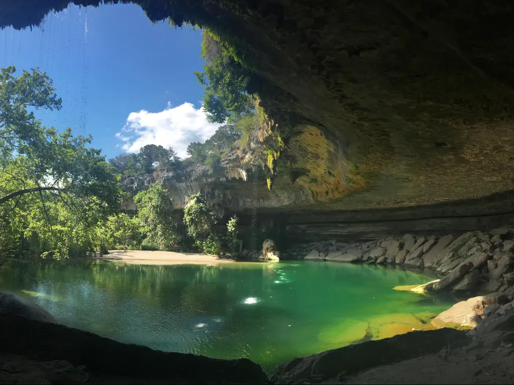 Hamilton Pool Preserve, in the Texas Hill Country. One of the most stunning Texas swimming holes and summer travel destinations.
