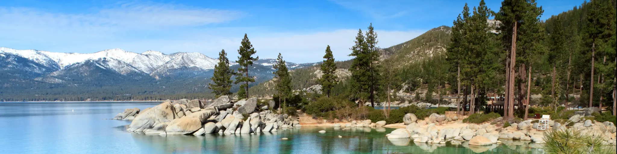 Lake Tahoe showing clear waters surrounded by pebbles