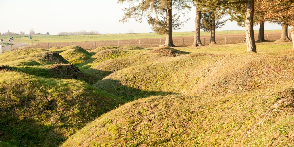 The grown over remains of trenches and bomb craters at the Beaumont Hamel Newfoundland Memorial, France