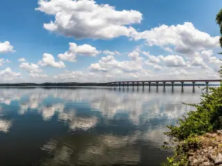 The Natchez Trace crosses a bridge over the Tennessee River near Cherokee, Alabama, on a cloudy day