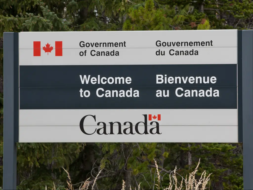 Sign at the border crossing between the United States and Canada saying Welcome to Canada.