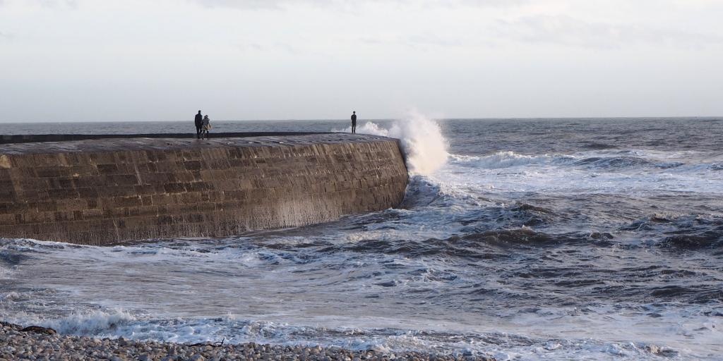 A wave breaking on The Cobb, Lyme Regis 