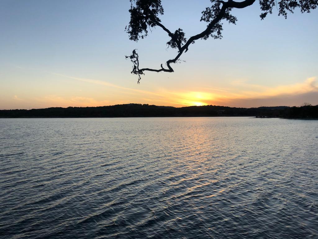 Beautiful sunset across the lake at Boerne City Lake Park