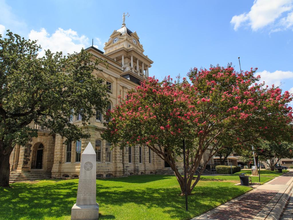 Located in Belton, the Bell County Courthouse is the third courthouse build on this site in 1884. Photo taken during sunny weather.