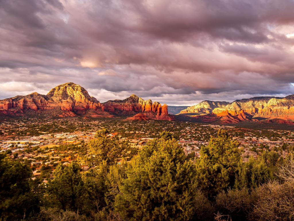 Coconino National Forest, USA taken at sunset over Thunder Mountain and other red rock mountains surrounding the town of Sedona.