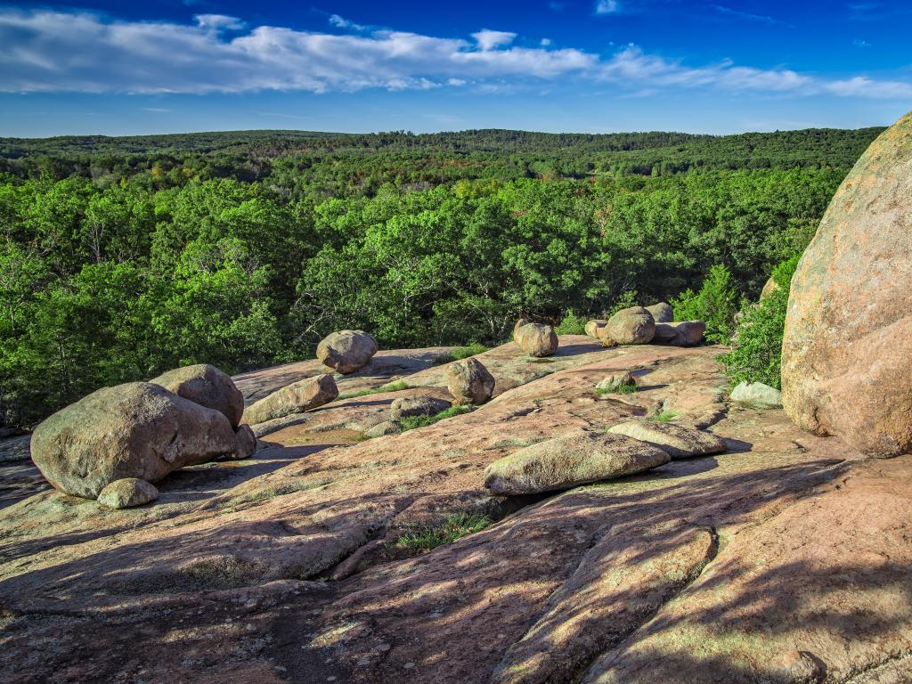 A view from the Elephant Rocks, Eastern Ozarks, Missouri, USA against a blue sky.