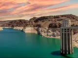 Panoramic photograph of Hoover Dam at sunset with low water level