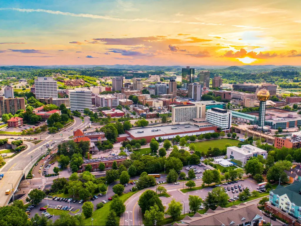 Knoxville, Tennessee, USA downtown skyline aerial at sunset.