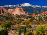 Garden of the Gods, Colorado Springs, USA with a beautiful view of the Garden of the Gods Park with Pikes Peak soaring in the background, taken on a sunny clear day.