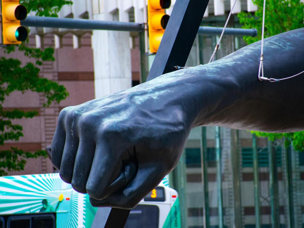 Detailed shot of The Fist Joe Louis monument in Hart Plaza attraction in downtown Detroit in the summer, taken on a bright sunny day