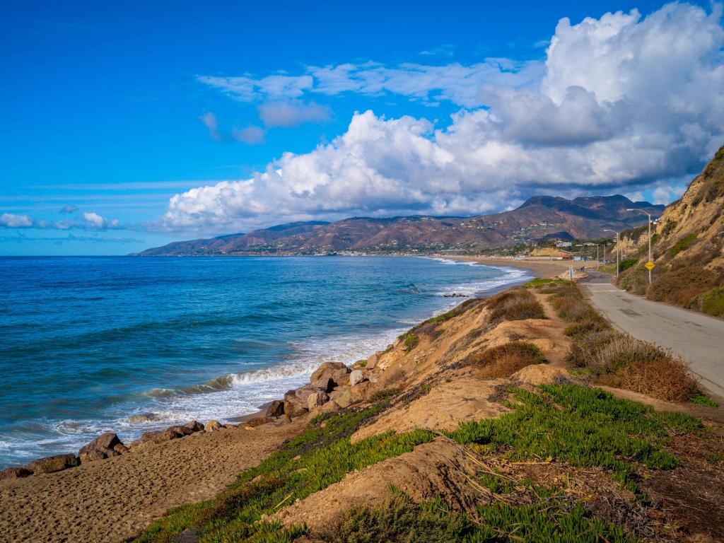 Panoramic seascape of Zuma Beach, Malibu, California, with views of the Pacific Ocean and blue horizon