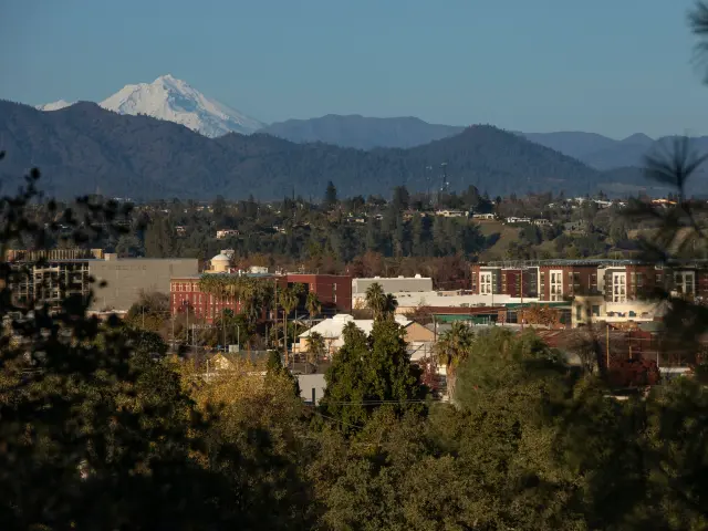Downtown skyline of Redding with snow-capped Mt Shasta in the background