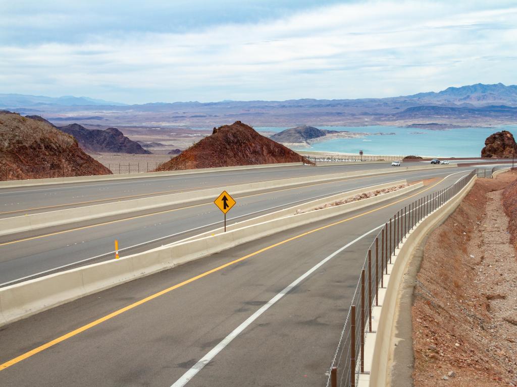 Interstate 11 with Lake Mead and mountains in the background, Nevada