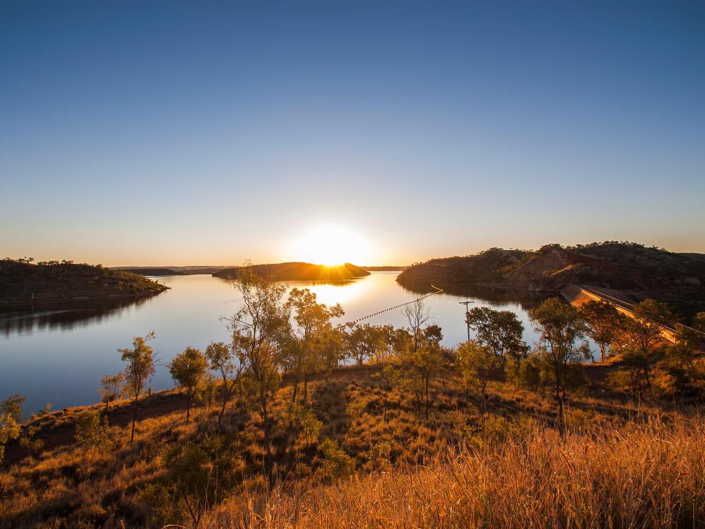 Lake Moondarra in Australia at Sunset with shrubbery in the foreground 