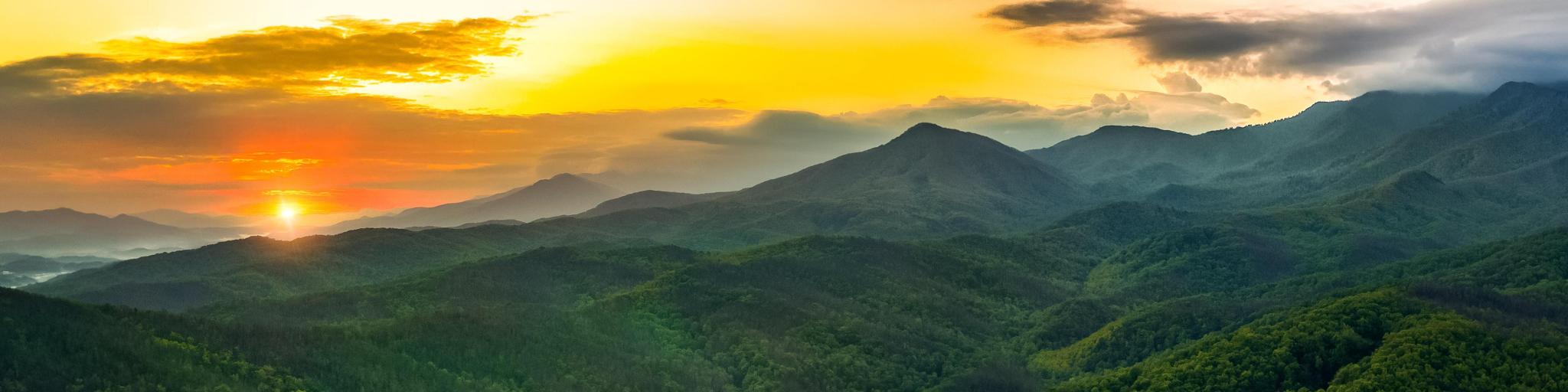 Wide view of the stunning scenery of the Great Smokey Mountains at sunset.