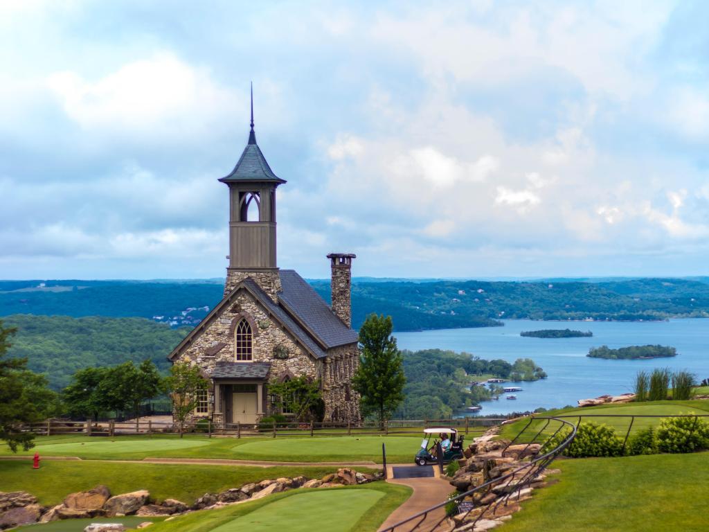 Branson, Missouri, USA with a view of the stone church at top of the rock overlooking the city.