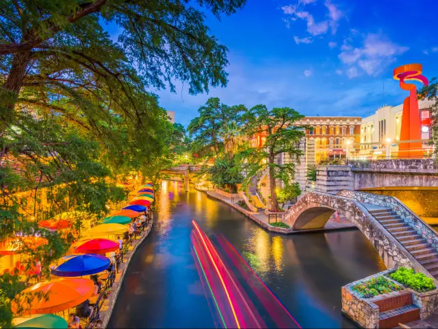 San Antonio, Texas, USA cityscape at the River Walk with colorful umbrellas at early evening.