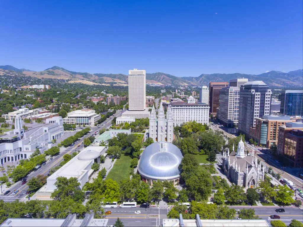 An image that has Temple Square, Salt Lake Temple, LDS Church Office Building in downtown Salt Lake City, Utah on a clear bright sky.
