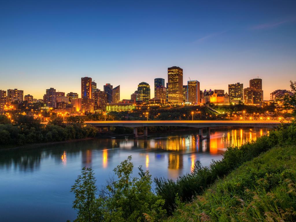 Edmonton downtown, James Macdonald Bridge and the Saskatchewan River at night, Alberta, Canada. Long exposure.