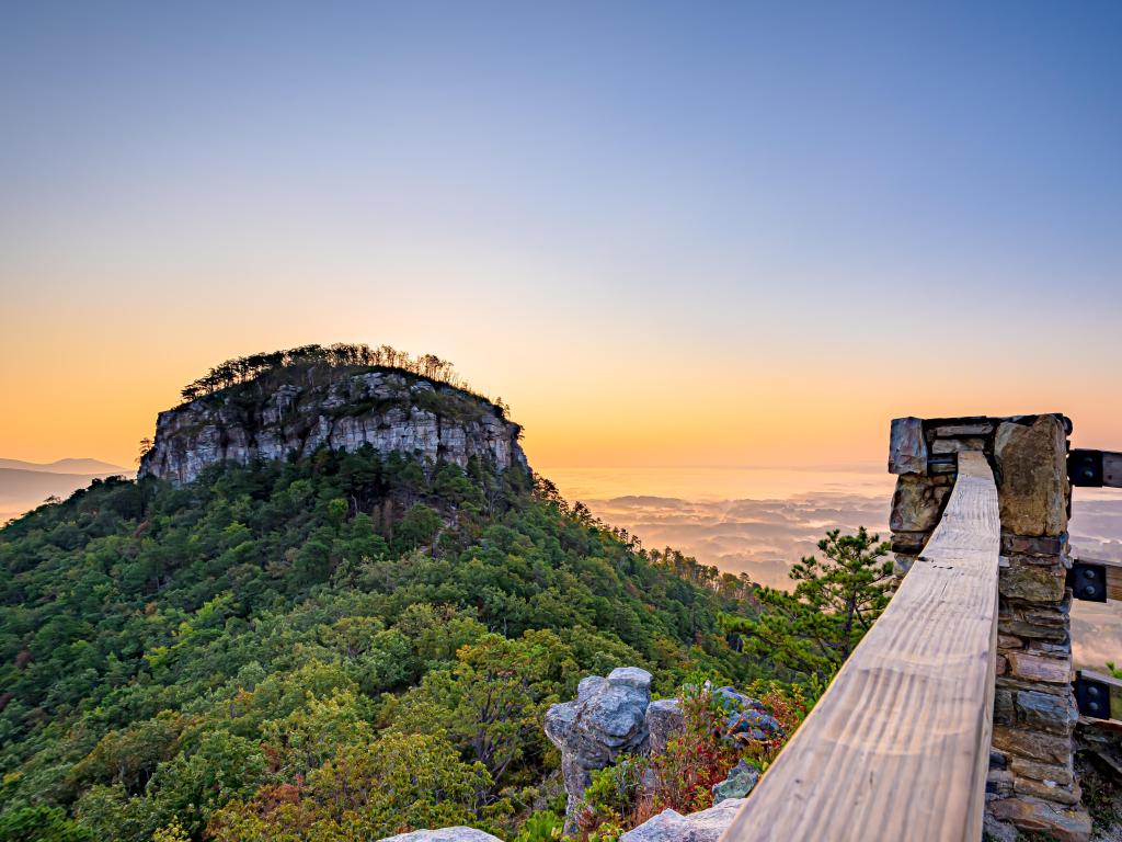 Pilot Mountain State Park, North Carolina, USA with a sunrise view from Little Pinnacle Overlook.