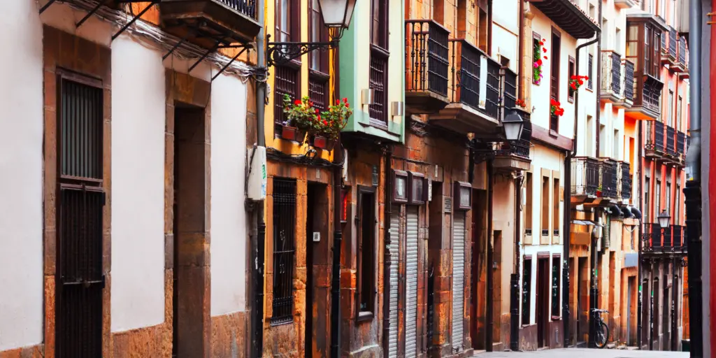 A narrow picturesque street in the old part of Oviedo in Spain