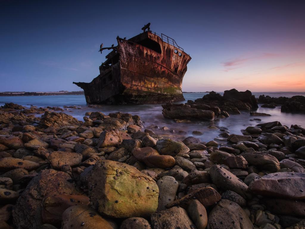 Agulhas National Park, South Africa with a beautiful landscape photo of the Meisho Maru Shipwreck along the Agulhas Coast at the Southern most tip of Africa and South Africa.