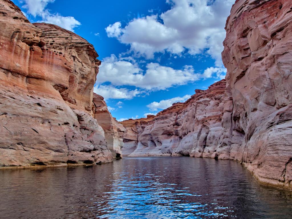 Glen Canyon National Recreational Area, Utah with a view of narrow, cliff-lined canyon from the lake.