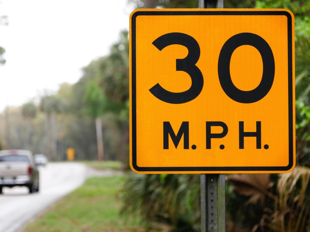 Road sign in USA, showing that the speed limit is 30 mph.