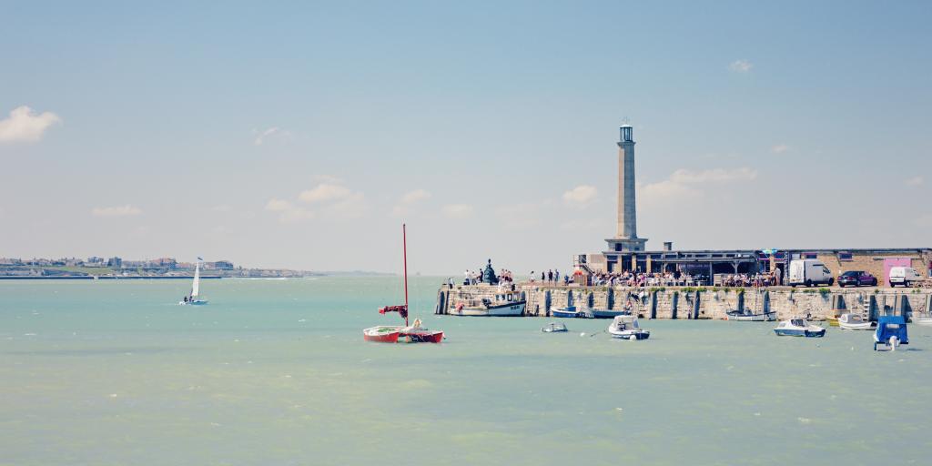 The lighthouse and Harbour Arm just out into the sea in Margate