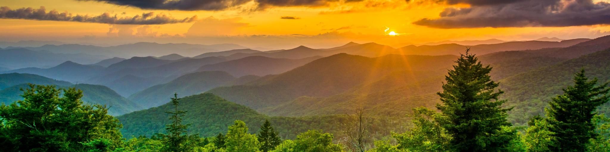 Sunset over the Appalachian Mountains from Caney Fork Overlook on the Blue Ridge Parkway in North Carolina.
