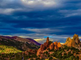 Garden of the Gods, Colorado Springs, at dusk with the rugged mountains in the background
