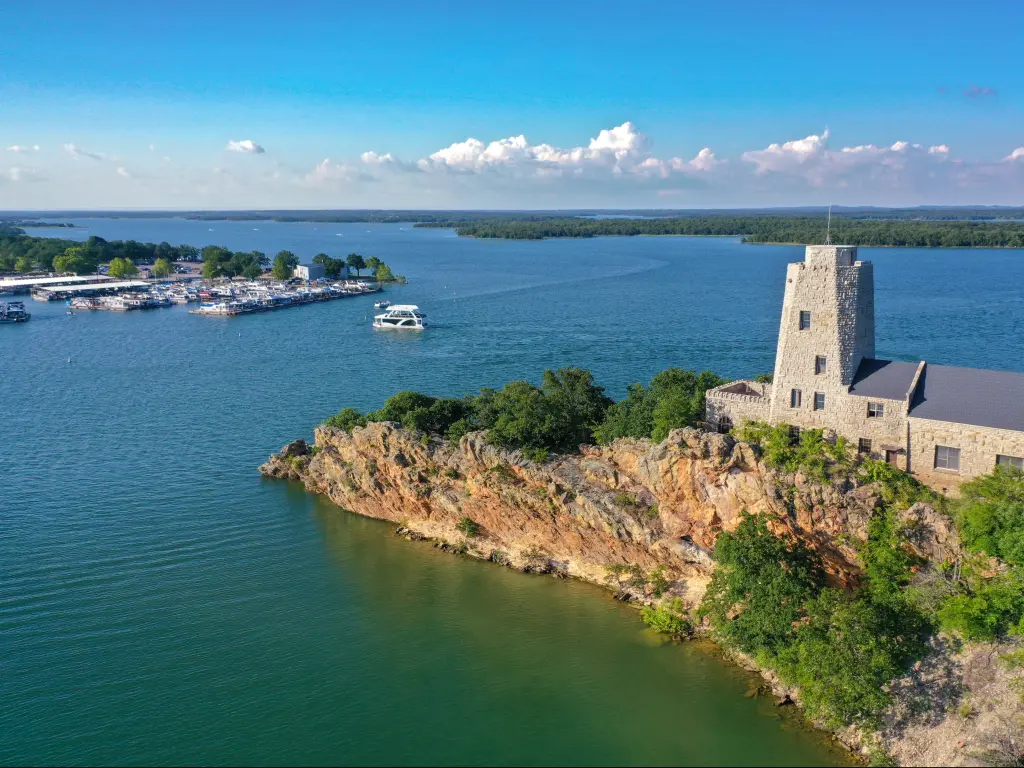 Tucker Tower on a rocky outcrop on Lake Murray in Oklahoma.