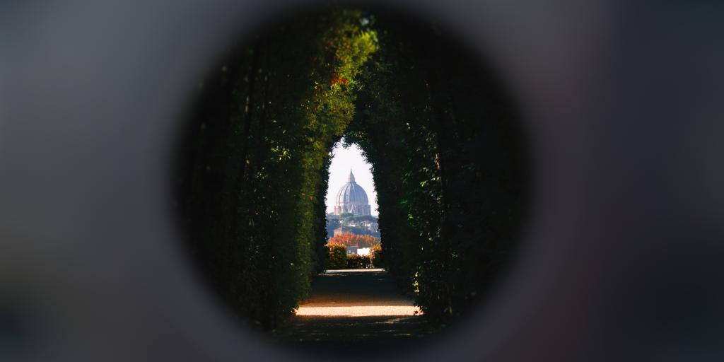 The view of St Peter's Basilica through Aventine Keyhole in Rome 